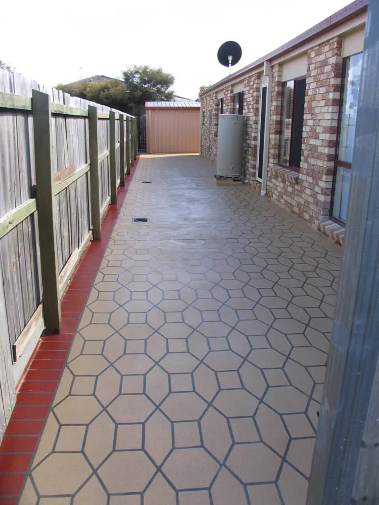 Octagon and square tile pattern in decorative concrete along a path
